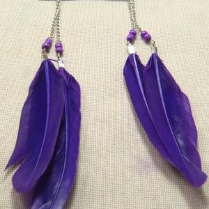 Feather earrings brand new